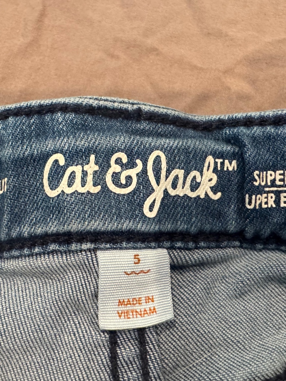 two pairs of jeans size 5: Cat & Jack, Jumping Beans